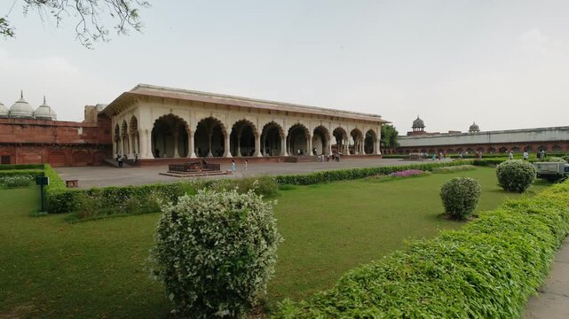 Tourists visit diwan i aam public audience hall at agra fort, a unesco world heritage site in india