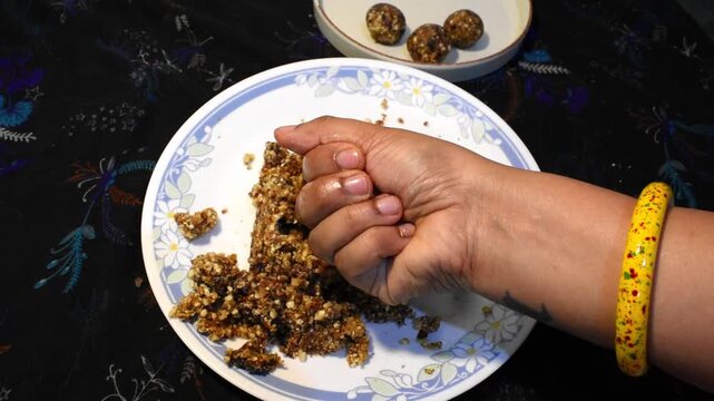 Making laddu for diwali festival.