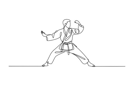 Continuous one line drawing of a karate fighter doing a martial arts pose