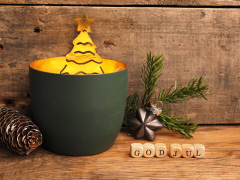 Small wooden block with the words God Jul and Christmas decoration