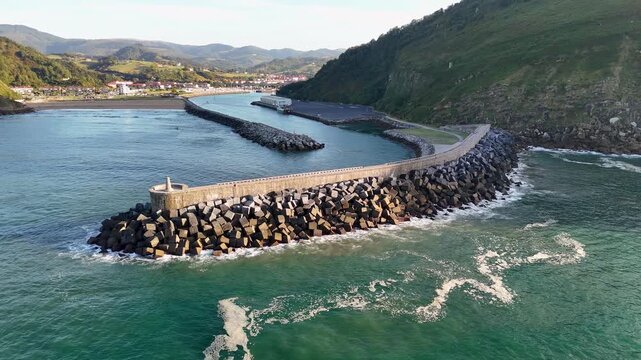 Aerial view of the Oria river estuary breakwater in Orio
