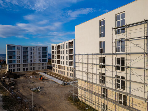 Aerial view of new apartment buildings under construction near the sea coast