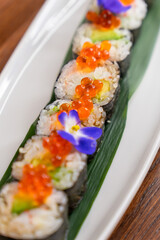 Maki sushi rolls with orange caviar © BY-_-BY