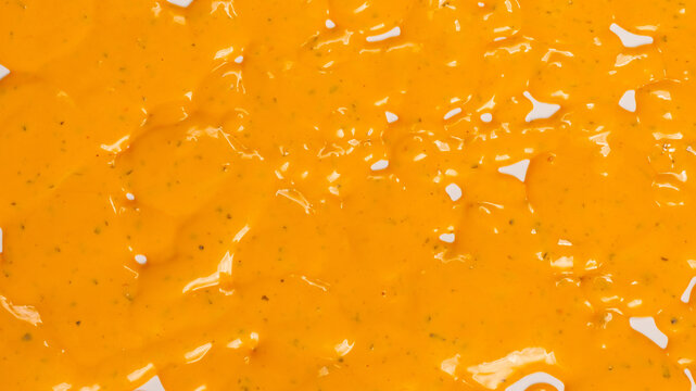 Whipped delicious sauce texture. Hamburger sauce background.