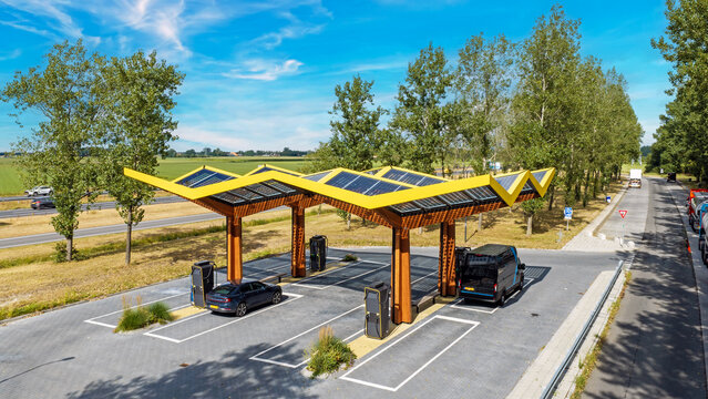 Aerial view of an electric charging station with solar panel roof in the Netherlands