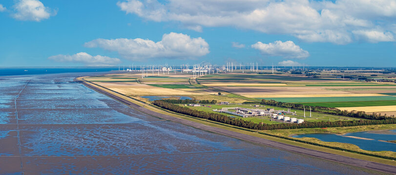 Aerial view of the gas transmission facility and wind turbines in Eemshaven, Groningen, Netherlands.