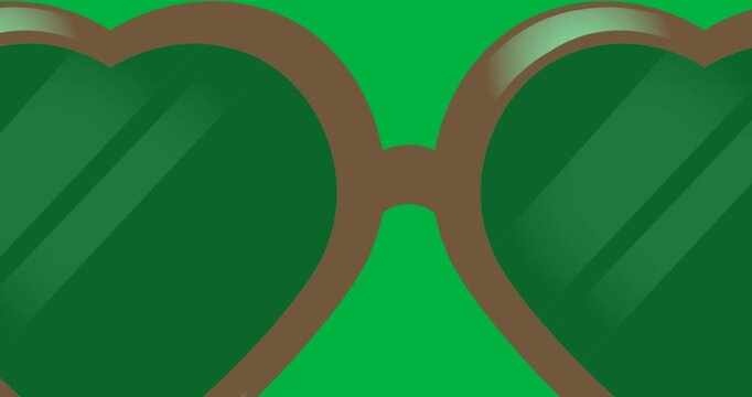 Digitally animation of heart shaped sunglasses icon against black background