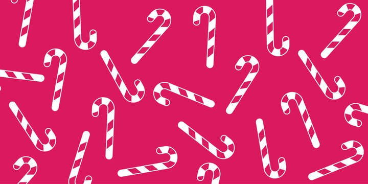 Vibrant holiday seamless pattern with red and white striped Christmas candy canes arranged on a pink backdrop. Great for festive packaging design, party invitations, and winter digital paper.