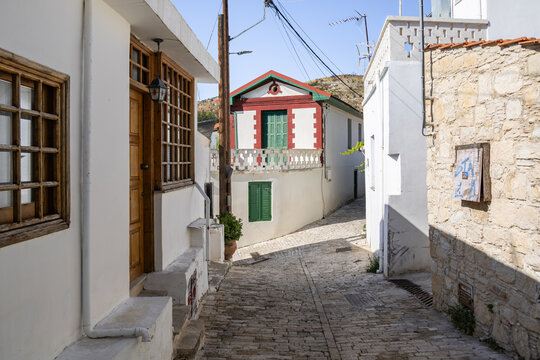 Ornately decorated private houses on a quiet narrow Panagias Chalkidikis Street in mountain Omodos village in Cyprus