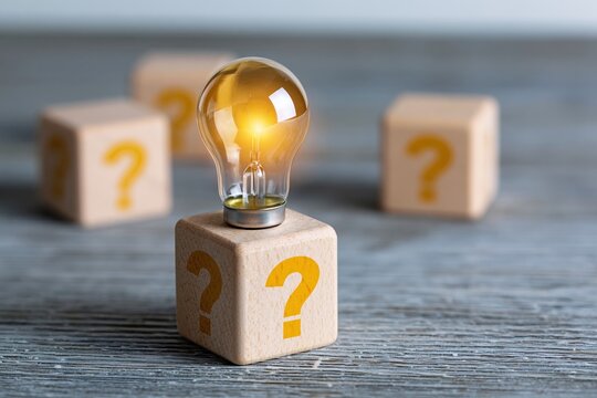 The Lightbulb atop a Question Cube Illuminating Curious Concepts and Ideas