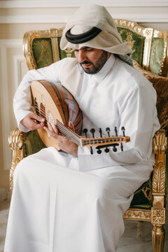 Arab man playing Oud