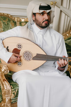 Arab man playing Oud