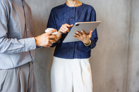 Business Meeting in a Modern Office With Digital Tablet Use