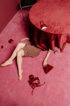 Red Handbag Mystery Under Round Table