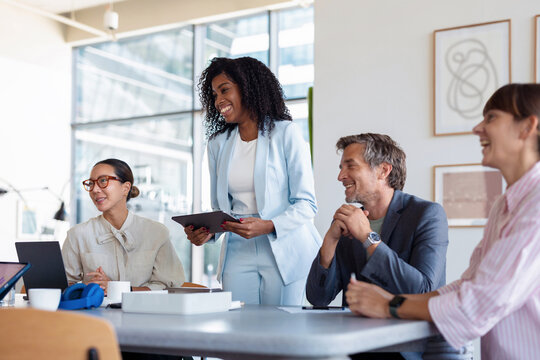 Diverse Team Collaborating During Casual Office Business Meeting