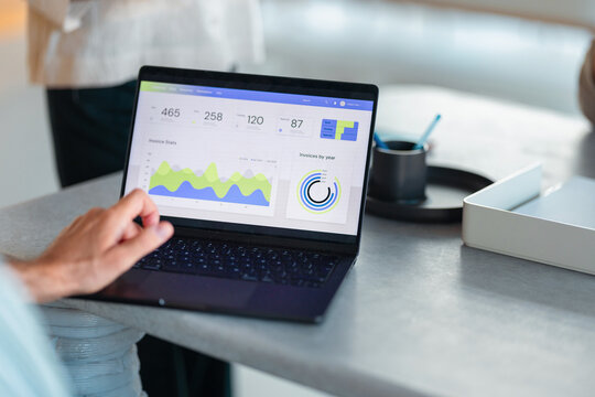 Business Analytics Dashboard on Laptop in Office