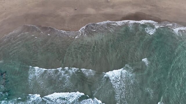 Aerial revealing view of Antilla beach in Orio, Basque Country
