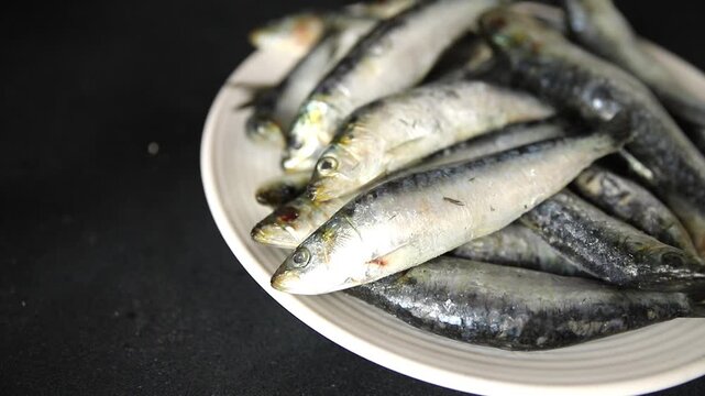 Sardines fish fresh small seafood pescatarian diet serving size fish&nbsp;natural ingredients healthy eating, wholesome dish, tasty snack fresh, gourmet, rustic food background on the table top view copy s
