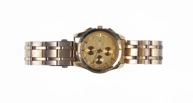 Vintage wristwatch with a strap, isolated on a white background.
