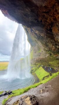 Seljalandsfoss Waterfall with Path Behind Falling Water in Iceland