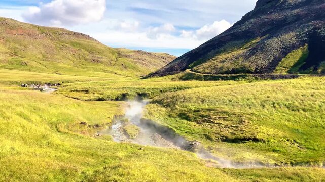 Steaming Hot River and Geothermal Landscape in Reykjadalur Valley, Iceland