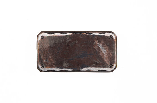 Old, worn metal frame or plate, isolated on a white background.