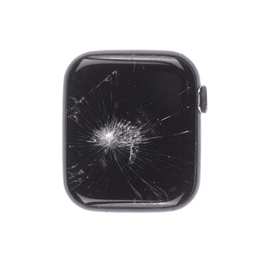 cracked black digital wristwatch isolated on a white background