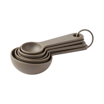 Set of brown plastic measuring spoons on a metal ring isolated on a transparent background cutout