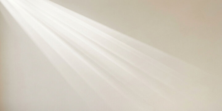 Soft white light beam shining diagonally against a plain beige wall with interior design abstract background spotlight minimalist illumination interior gradient perspective elegance