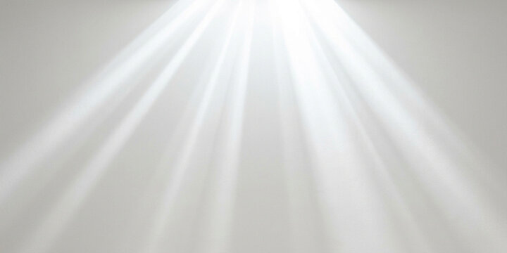 Vertical light rays shining down on a solid neutral grey background with bright vertical rays of light creating an ethereal effect on a flat grey surface abstract effect sun