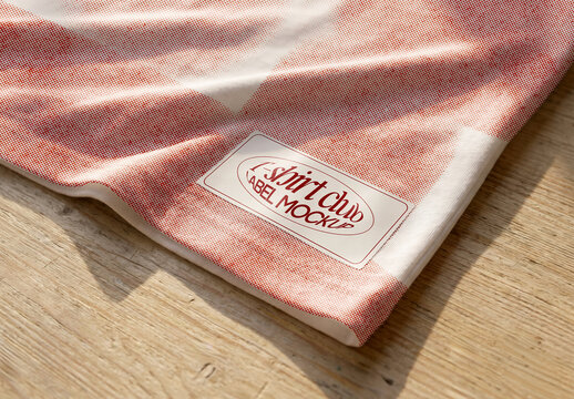 Clothing Label on Folded Fabric Mockup