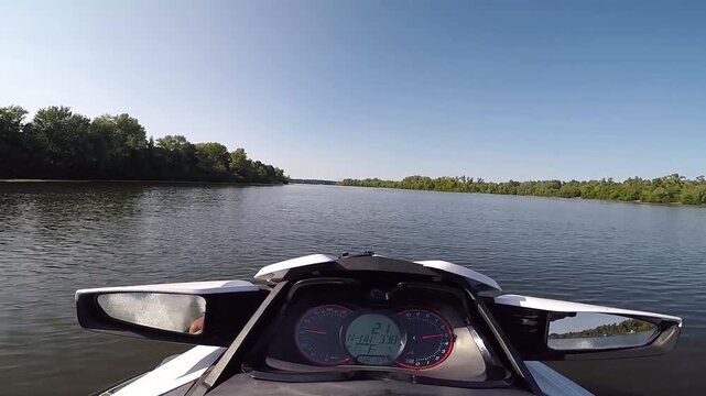 Riding a jet ski on river