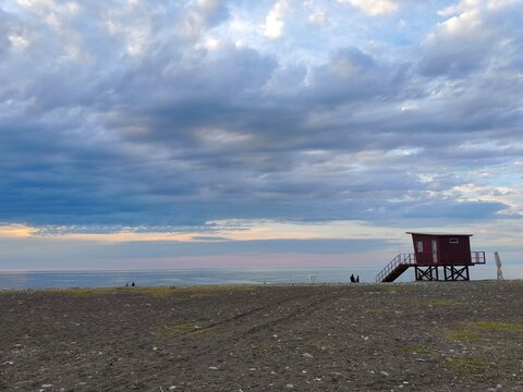 Road to the sea and life guard tower.