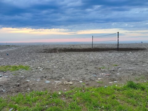 Volleyball net on the sea beach.