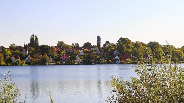 the big ploener lake in germany with ploen cityscape 4k video