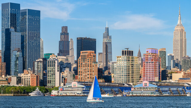 Blue Sailboat on Hudson River with Midtown Manhattan Skyline