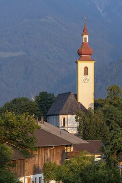 Parish church St. Margarethen in the first morning light, Buch in Tyrol, Tyrol, Austria