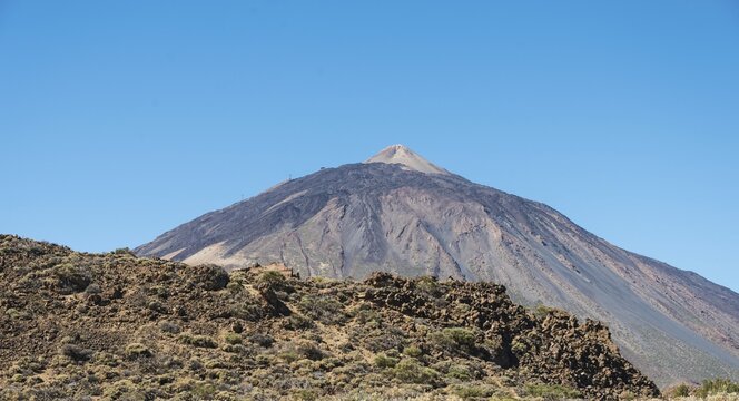 Volcanic landscape, plateau covered with shrubs, Llano de Uruanca with Pico del Teide, 3718m, Parque Nacional de las Ca&ntilde;adas del Teide, Teide National Park, UNESCO World Heritage Site, Tenerife, Canary Islands, Spain
