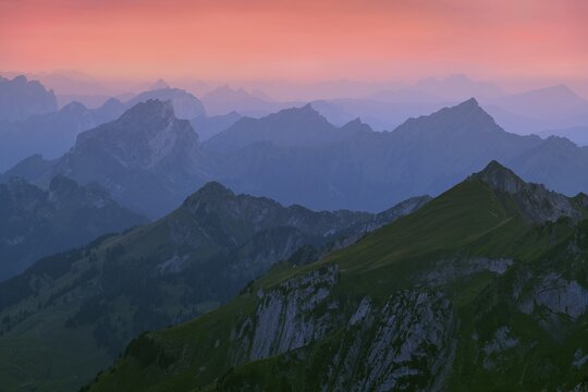 Appenzell Alps at dusk, behind Central Swiss Alps, Canton St. Gallen, Switzerland