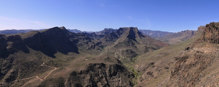 Panorama shot, Barranco de Fataga, deep gorge, green-brown mountainsides, Massif Central, south coast, Gran Canaria, Canary Islands, Spain
