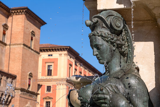 Water coming from ladies breasts, part of Fountain of Neptune (created in 1550) in Piazza del Nettuno in the heart of the historic University city of Bologna,