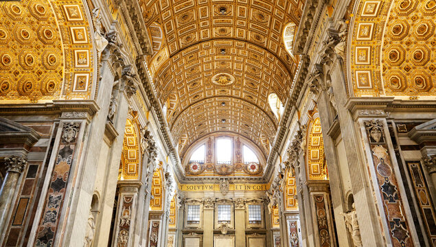 Interior architecture and ecclesiastical designs inside St, Peter's Basilica in the Vatican City, one of the world's largest churches, which dominates the papal enclave in Rome