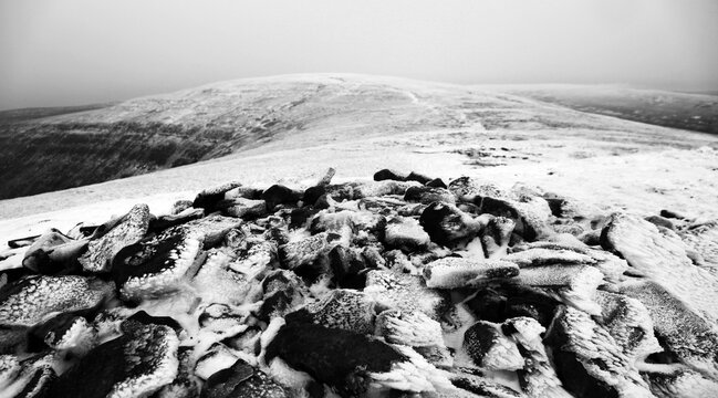 Snow and ice on the summit of Waun Fach, Brecon Beacons National Park, South Wales