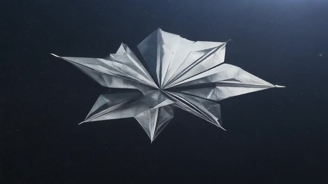 Abstract Metallic Star Flower Origami Reflected on Dark Surface