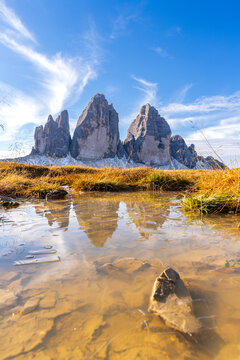 The three peaks of Lavaredo reflecting in the water of a pond at morning, Sesto (Sexten), Dolomites, UNESCO world heritage site, South Tyrol (Trentino-Alto Adige), Italy
