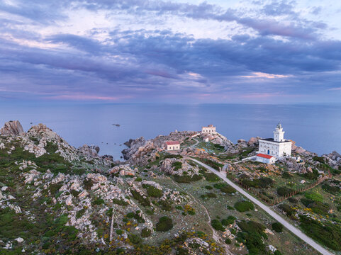 Capo Testa lighthouse seen from the drone at dawn, Santa Teresa di Gallura, Mediterranean Sea, Olbia-Tempio province, Sardinia, Italy