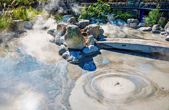 Oniishibozu Jigoku with its ponds of boiling grey mud in Beppu, Oita, Kyushu, Japan