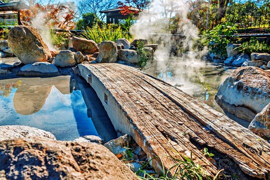 Oniishibozu Jigoku with its ponds of boiling grey mud in Beppu, Oita, Kyushu, Japan