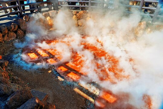 The red pond of Kamado Jigoku ('Furnace Hell'), Beppu, Oita, Kyushu, Japan