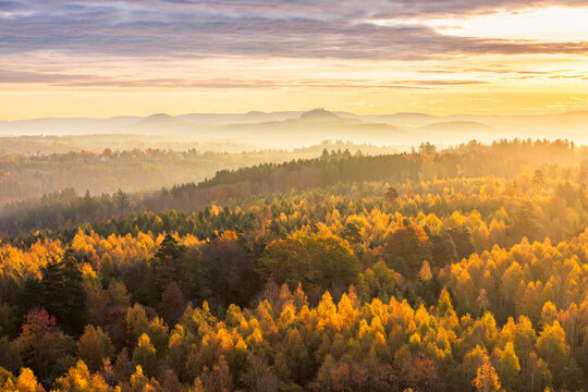 aerial view of Swabian forest, morning fog at sunrisse, colorful forest, autumn colours, Baden Wuerttemberg, Germany